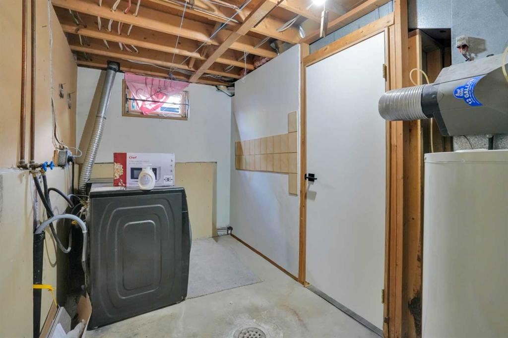44 Falmead Road Ne, Calgary, AB - Indoor Photo Showing Laundry Room
