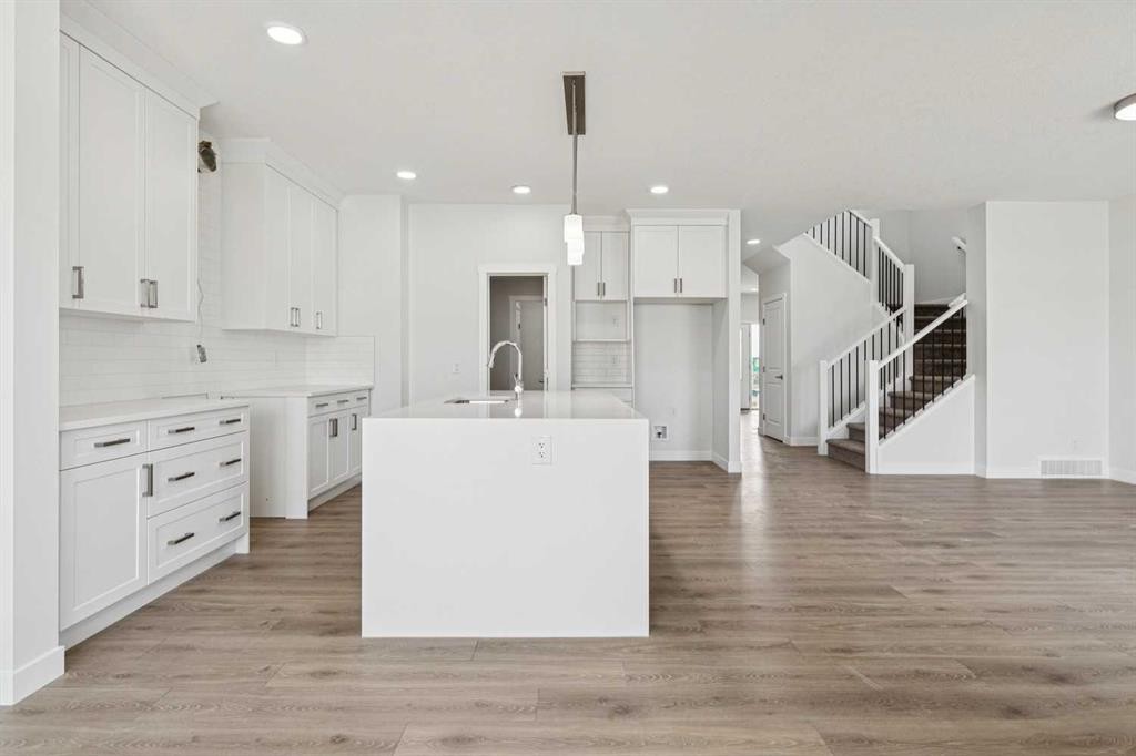10 Quartz Gate, Balzac, AB - Indoor Photo Showing Kitchen With Upgraded Kitchen