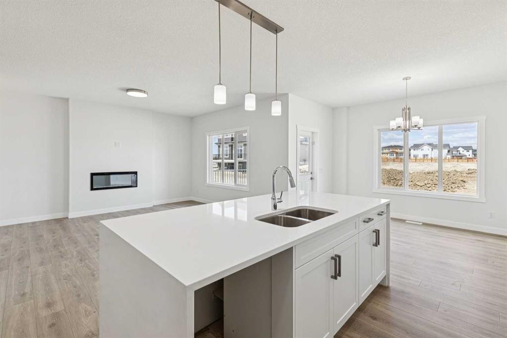 10 Quartz Gate, Balzac, AB - Indoor Photo Showing Kitchen With Double Sink