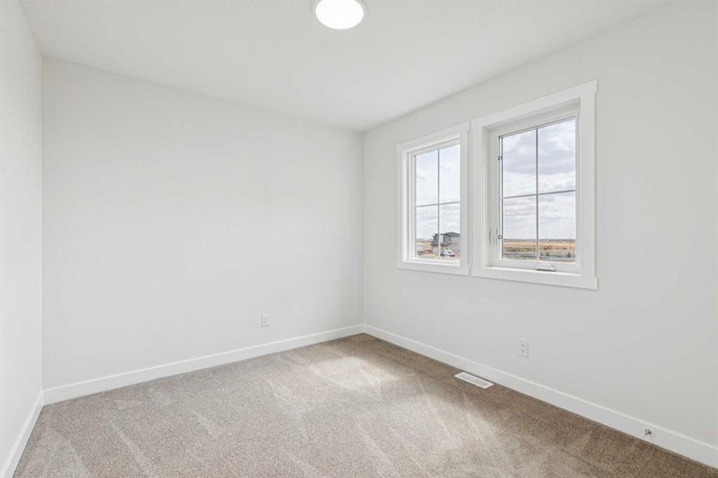 10 Quartz Gate, Balzac, AB - Indoor Photo Showing Other Room
