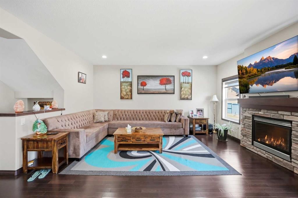 233 Aspenmere Circle, Chestermere, AB - Indoor Photo Showing Living Room With Fireplace