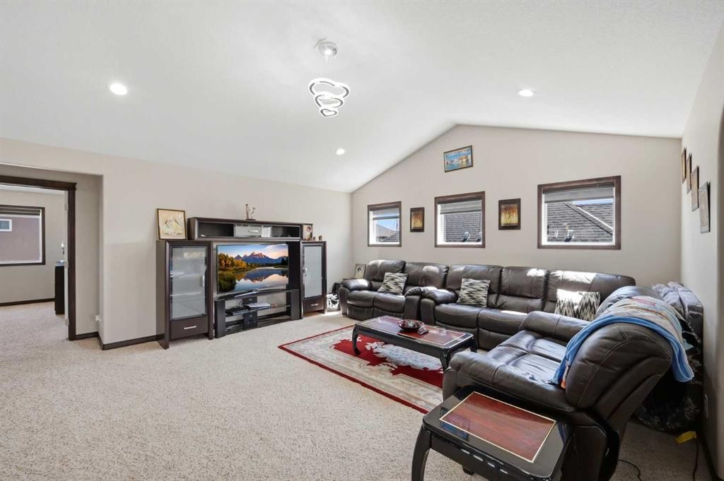 233 Aspenmere Circle, Chestermere, AB - Indoor Photo Showing Living Room