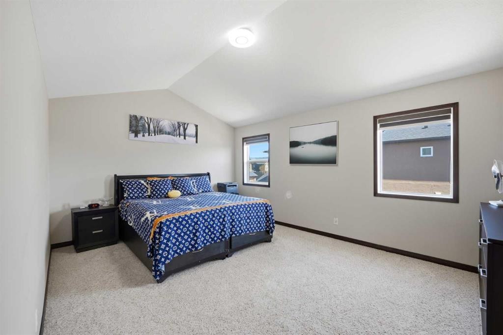 233 Aspenmere Circle, Chestermere, AB - Indoor Photo Showing Bedroom