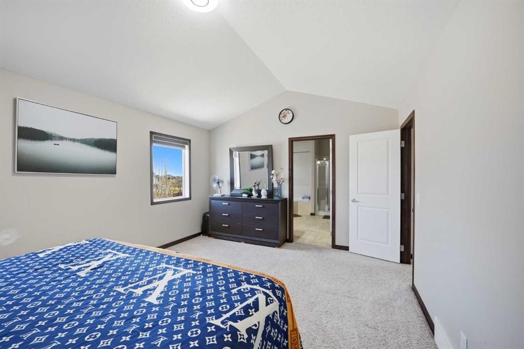 233 Aspenmere Circle, Chestermere, AB - Indoor Photo Showing Bedroom