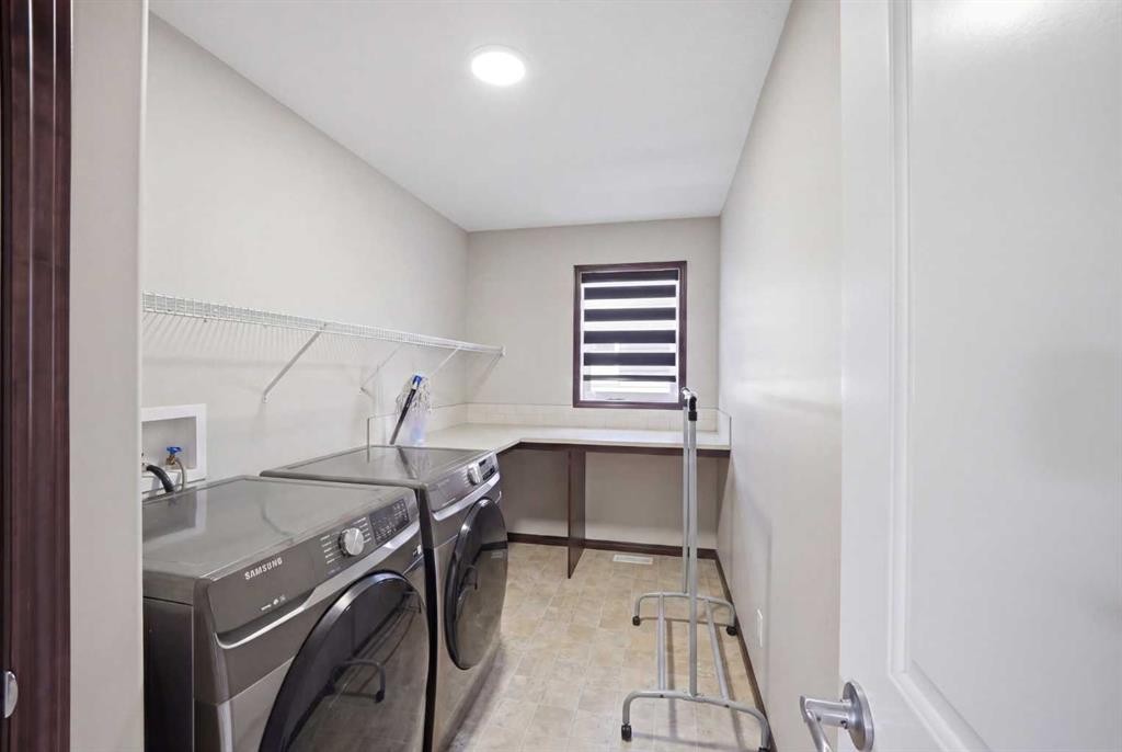 233 Aspenmere Circle, Chestermere, AB - Indoor Photo Showing Laundry Room