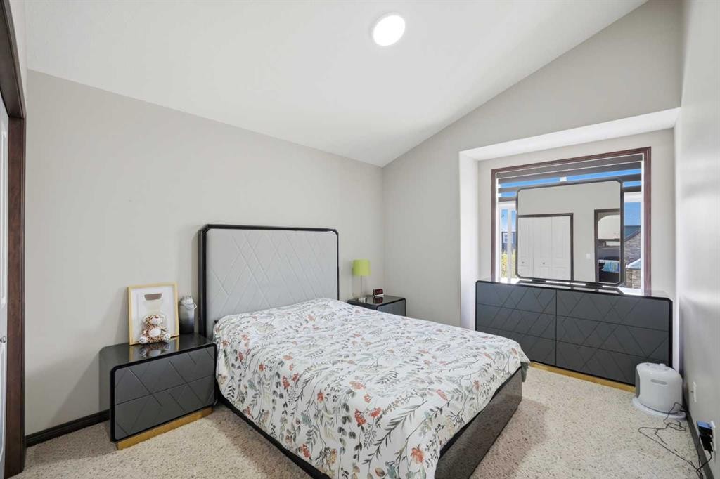 233 Aspenmere Circle, Chestermere, AB - Indoor Photo Showing Bedroom