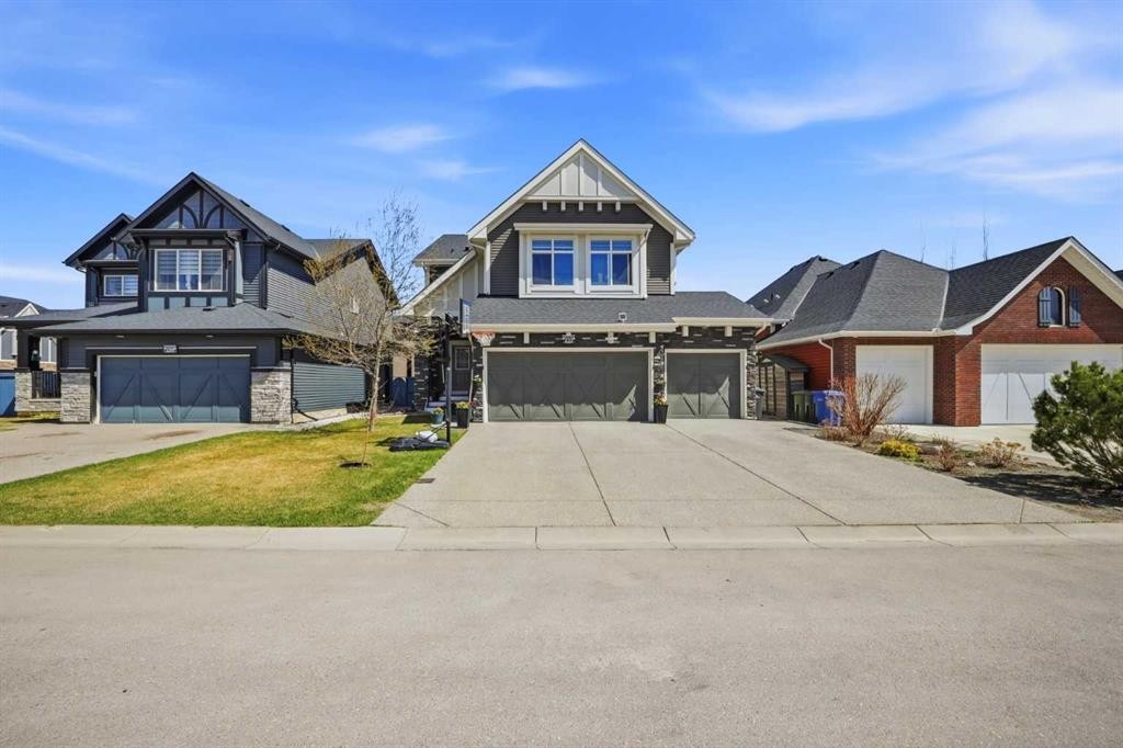 233 Aspenmere Circle, Chestermere, AB - Outdoor With Facade