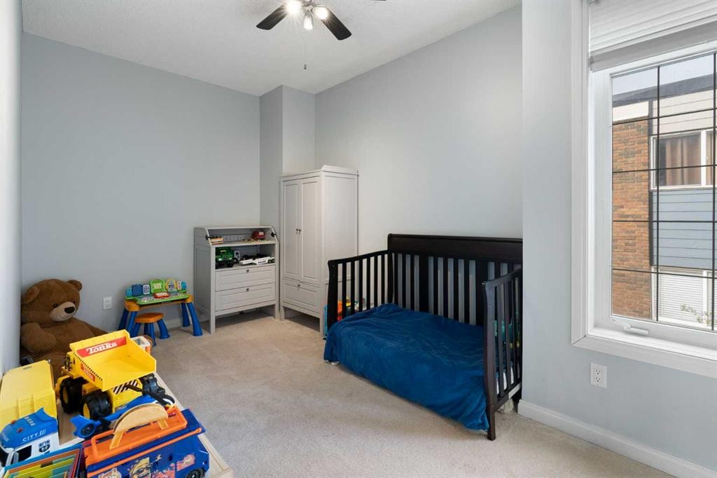 210-5703 5 Street Sw, Calgary, AB - Indoor Photo Showing Bedroom