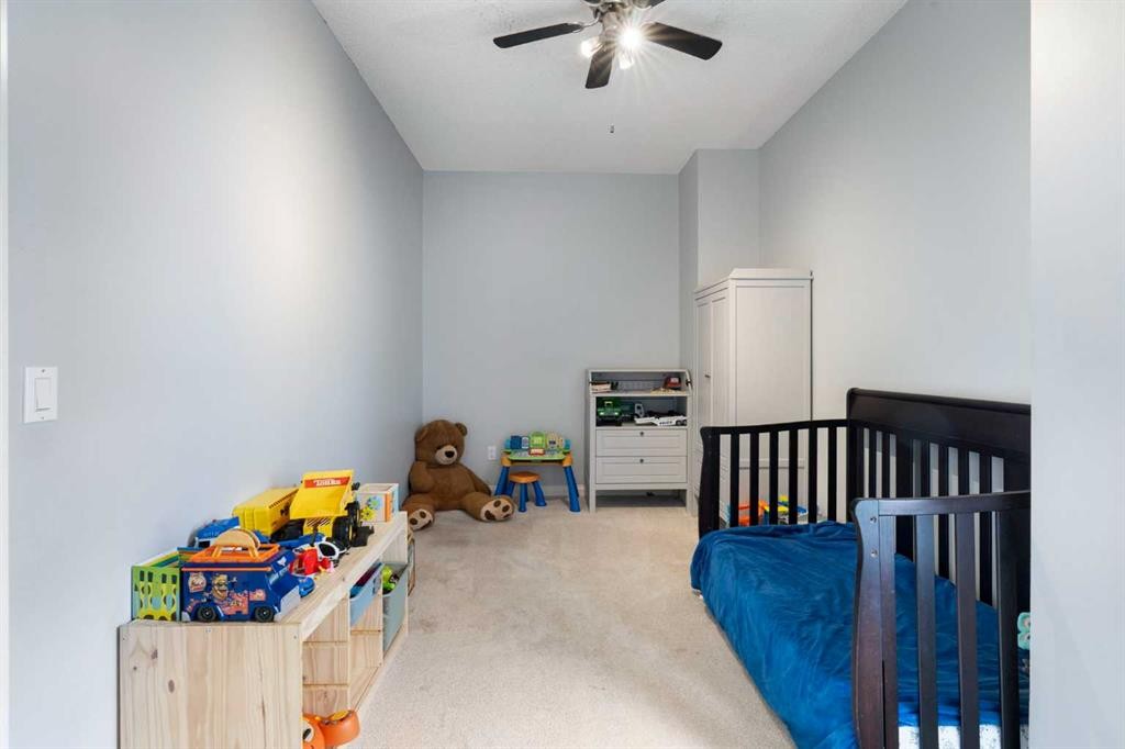 210-5703 5 Street Sw, Calgary, AB - Indoor Photo Showing Bedroom