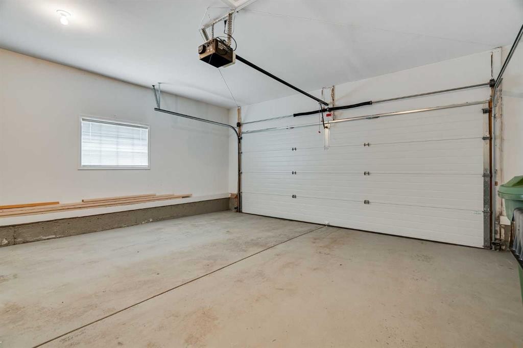 58 Evergreen Bay Sw, Calgary, AB - Indoor Photo Showing Garage