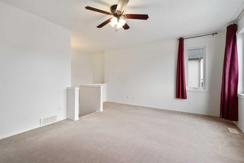 112 Everridge Drive Sw, Calgary, AB - Indoor Photo Showing Other Room