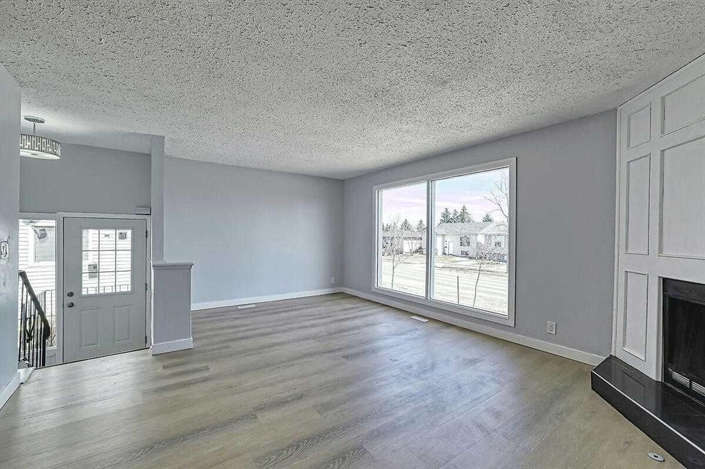 71 Falton Drive Ne, Calgary, AB - Indoor With Fireplace