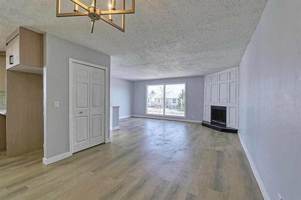 71 Falton Drive Ne, Calgary, AB - Indoor With Fireplace