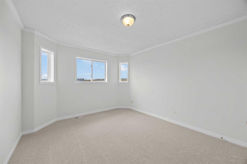 289 Hidden Spring Green Nw, Calgary, AB - Indoor Photo Showing Other Room