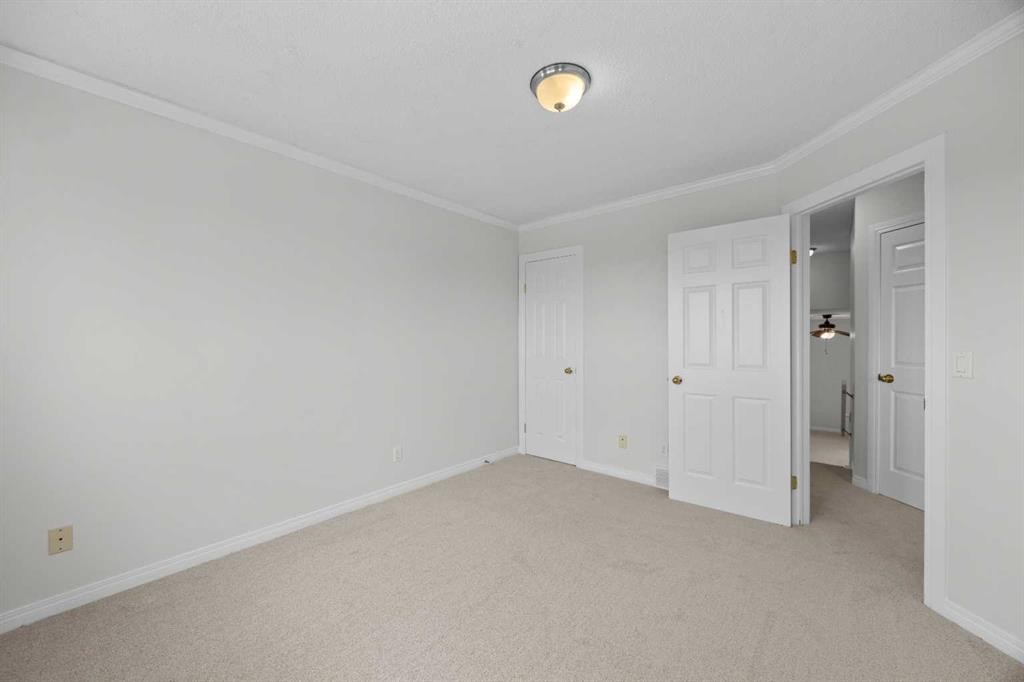 289 Hidden Spring Green Nw, Calgary, AB - Indoor Photo Showing Other Room
