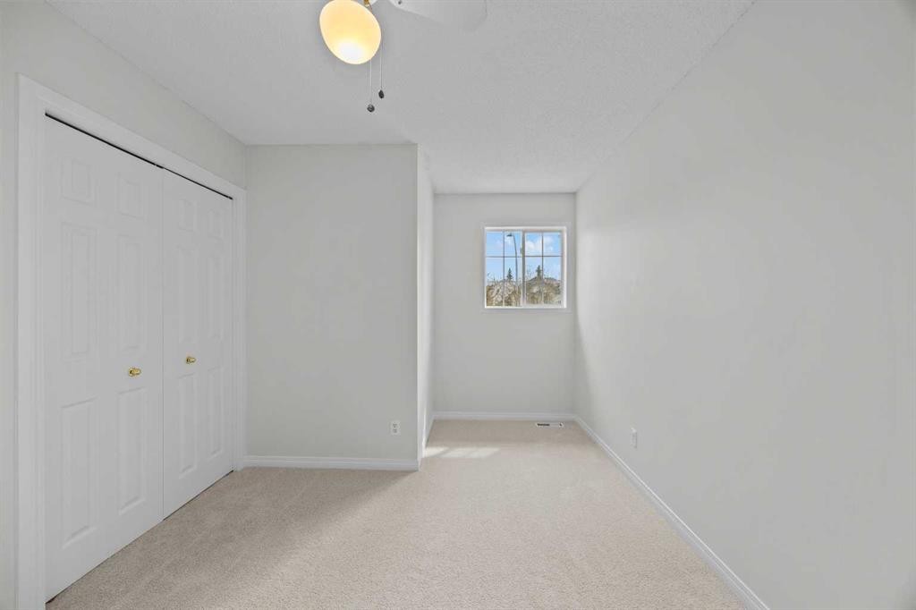 289 Hidden Spring Green Nw, Calgary, AB - Indoor Photo Showing Other Room