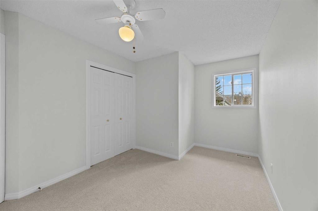 289 Hidden Spring Green Nw, Calgary, AB - Indoor Photo Showing Other Room