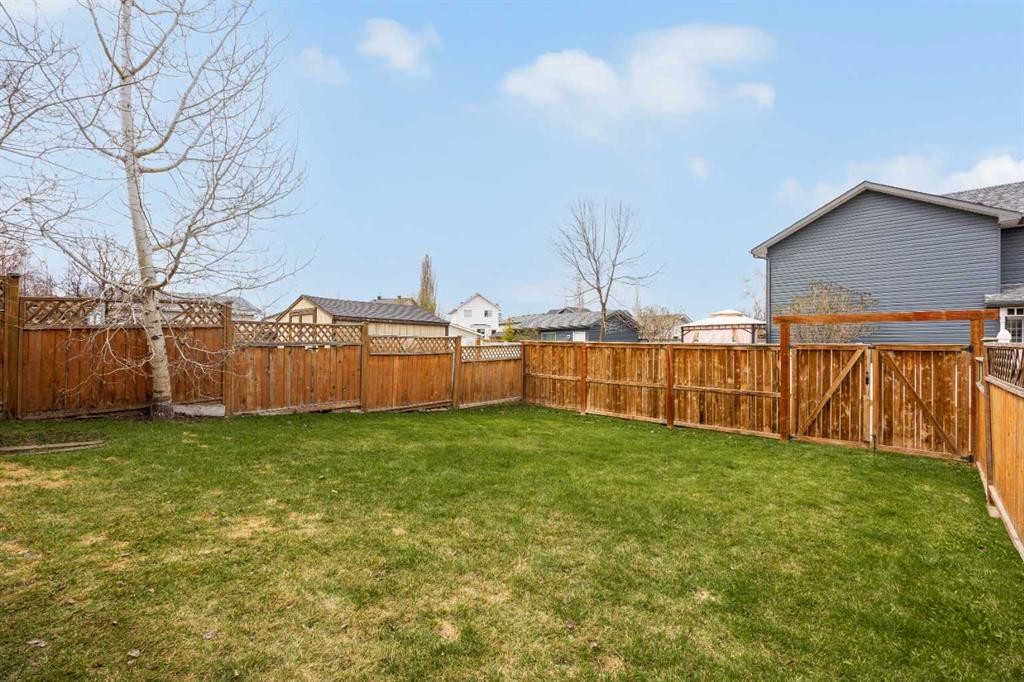 289 Hidden Spring Green Nw, Calgary, AB - Outdoor
