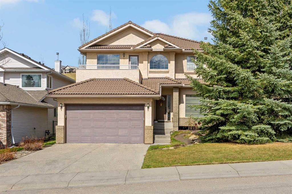 30 Gleneagles View, Cochrane, AB - Outdoor With Facade