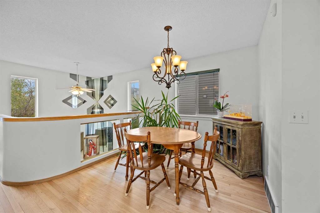 242 Hidden Spring Mews Nw, Calgary, AB - Indoor Photo Showing Dining Room