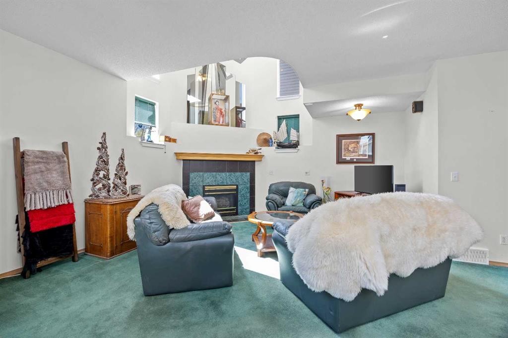 242 Hidden Spring Mews Nw, Calgary, AB - Indoor With Fireplace