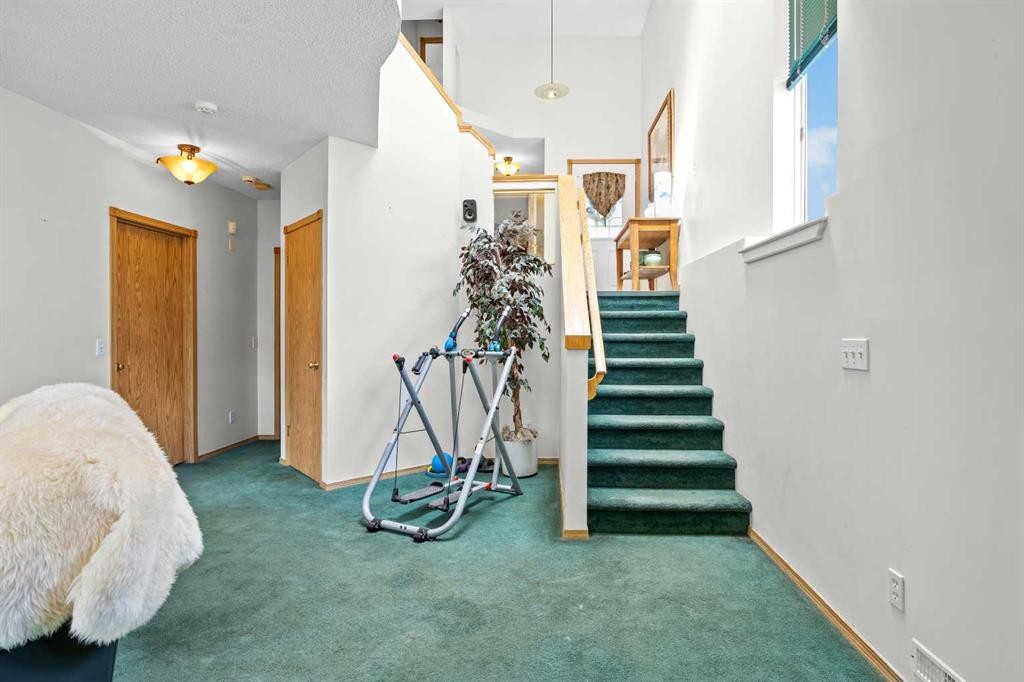 242 Hidden Spring Mews Nw, Calgary, AB - Indoor Photo Showing Other Room
