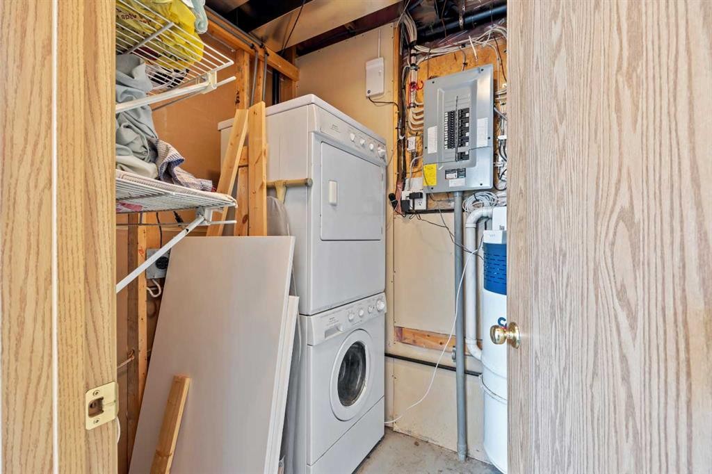 242 Hidden Spring Mews Nw, Calgary, AB - Indoor Photo Showing Laundry Room