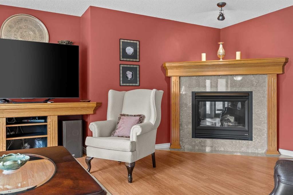 11178 Hidden Valley Drive Nw, Calgary, AB - Indoor Photo Showing Living Room With Fireplace