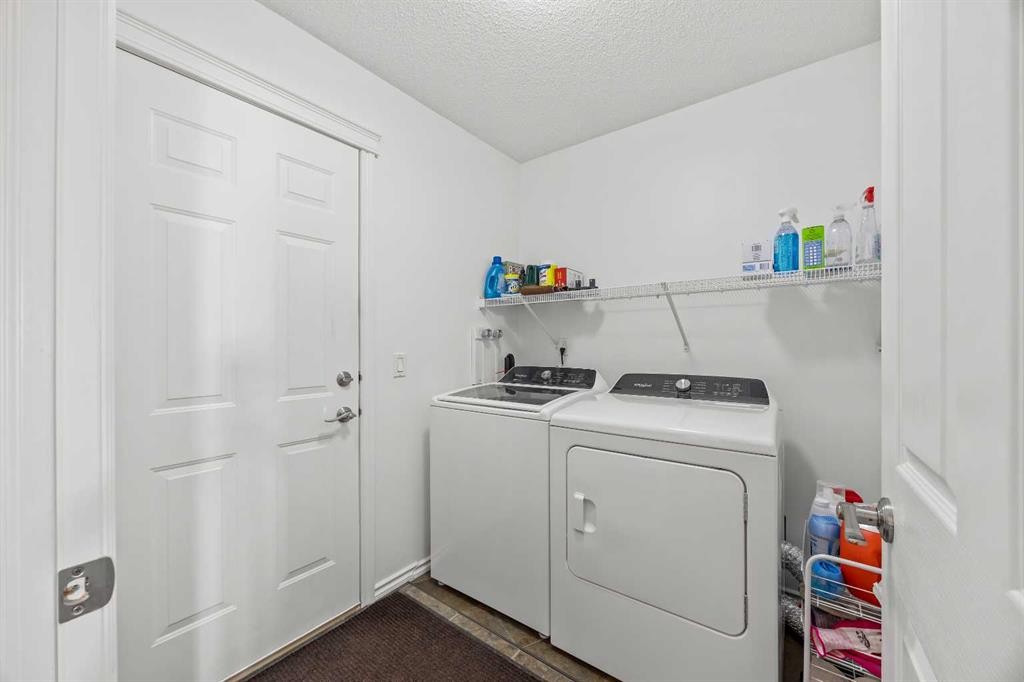 11178 Hidden Valley Drive Nw, Calgary, AB - Indoor Photo Showing Laundry Room