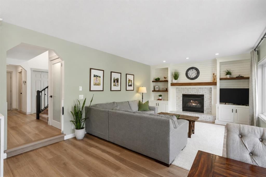 941 Riverview Place Se, Calgary, AB - Indoor Photo Showing Living Room With Fireplace