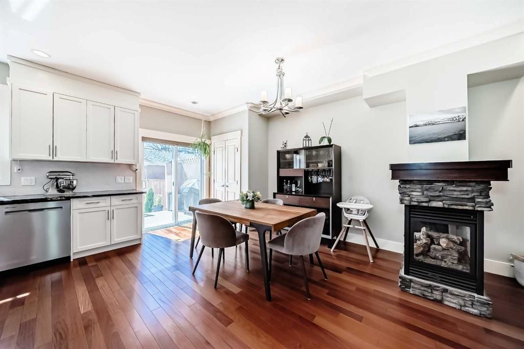 425 36 Avenue Nw, Calgary, AB - Indoor Photo Showing Other Room With Fireplace