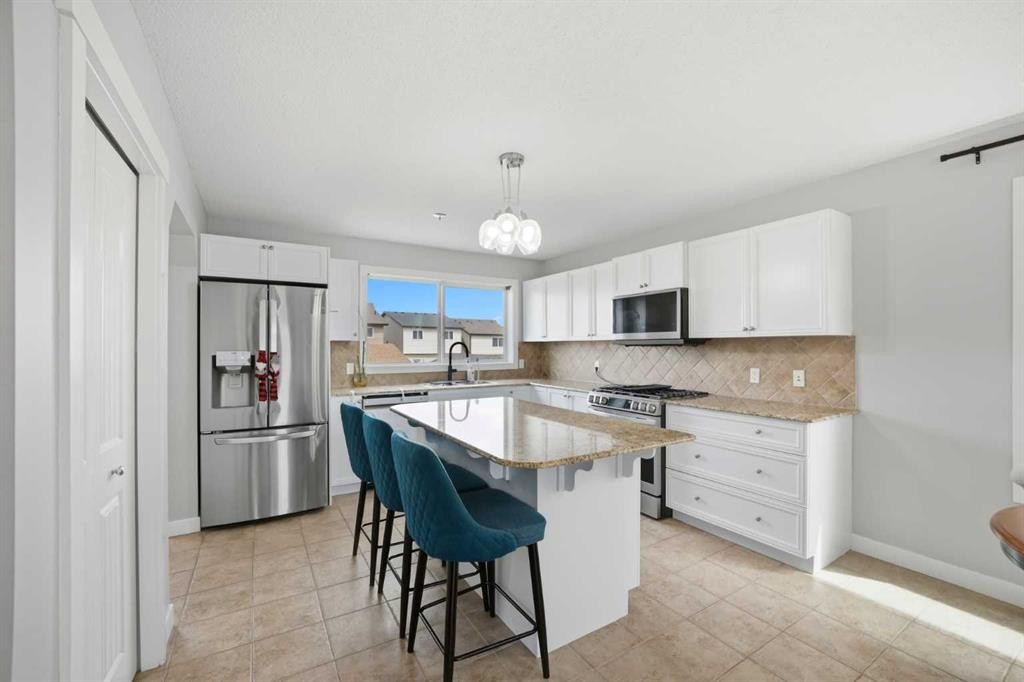 39 Panora Square Nw, Calgary, AB - Indoor Photo Showing Kitchen With Stainless Steel Kitchen With Upgraded Kitchen