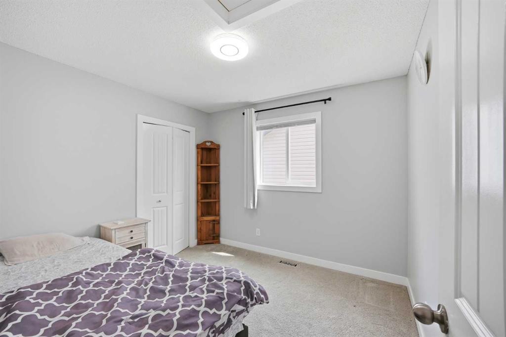 39 Panora Square Nw, Calgary, AB - Indoor Photo Showing Bedroom
