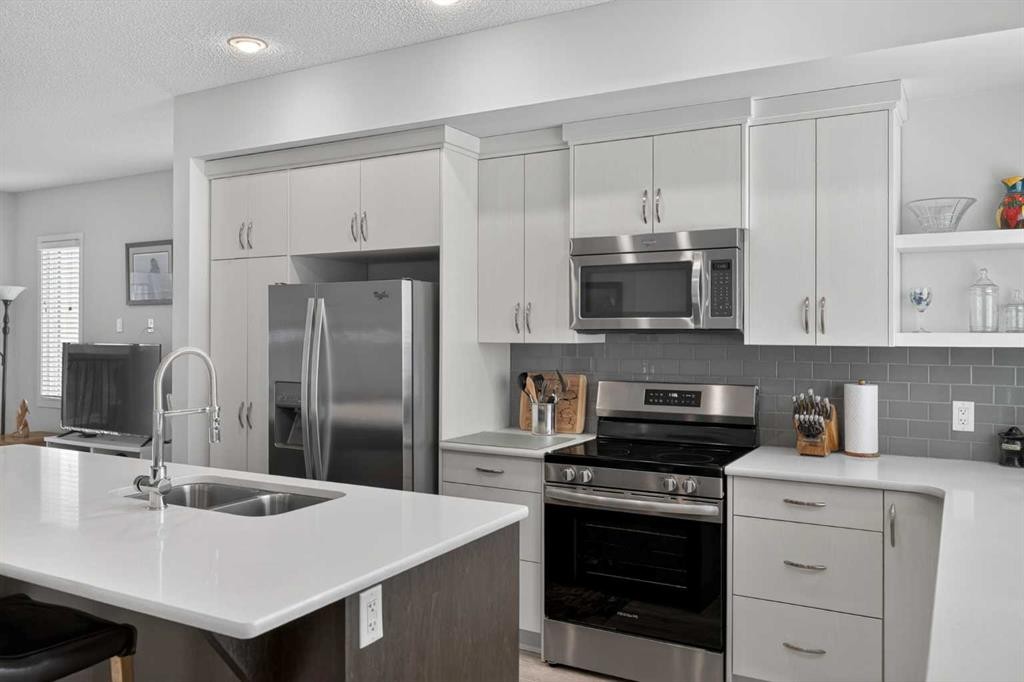 210 Nolanlake Villas Nw, Calgary, AB - Indoor Photo Showing Kitchen With Double Sink With Upgraded Kitchen