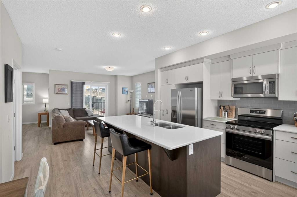 210 Nolanlake Villas Nw, Calgary, AB - Indoor Photo Showing Kitchen With Double Sink With Upgraded Kitchen