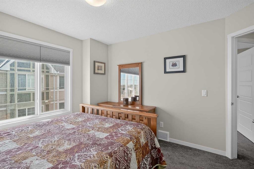 210 Nolanlake Villas Nw, Calgary, AB - Indoor Photo Showing Bedroom