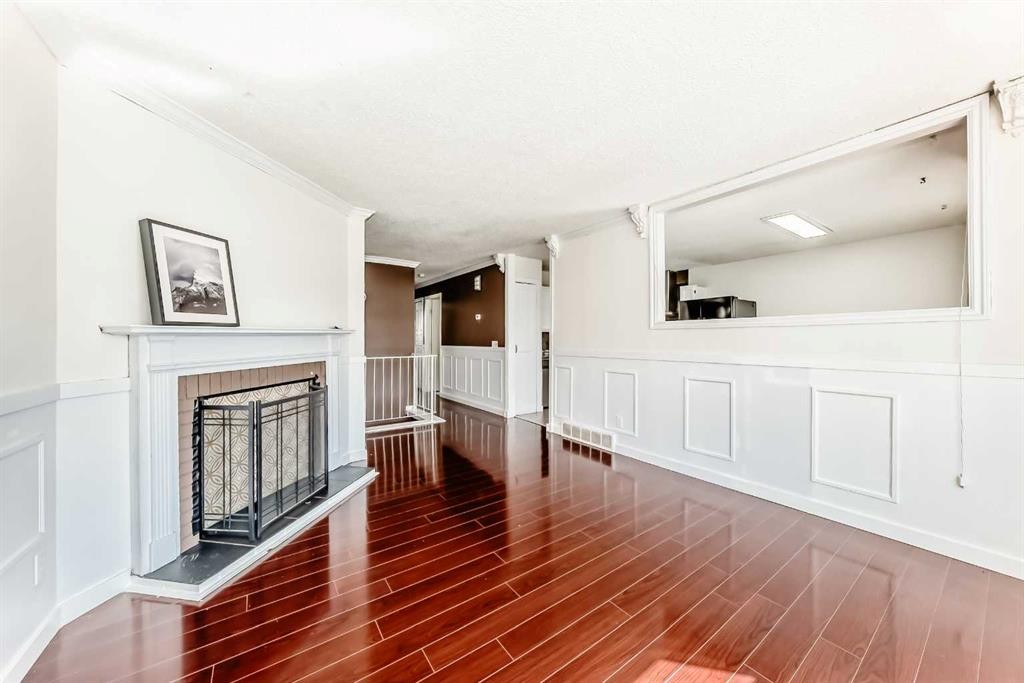 4208 58 Street Ne, Calgary, AB - Indoor With Fireplace