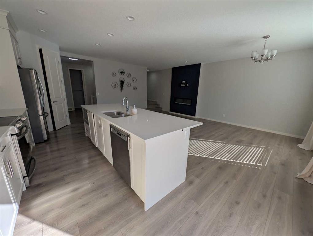 54 Seton Manor Se, Calgary, AB - Indoor Photo Showing Kitchen With Double Sink