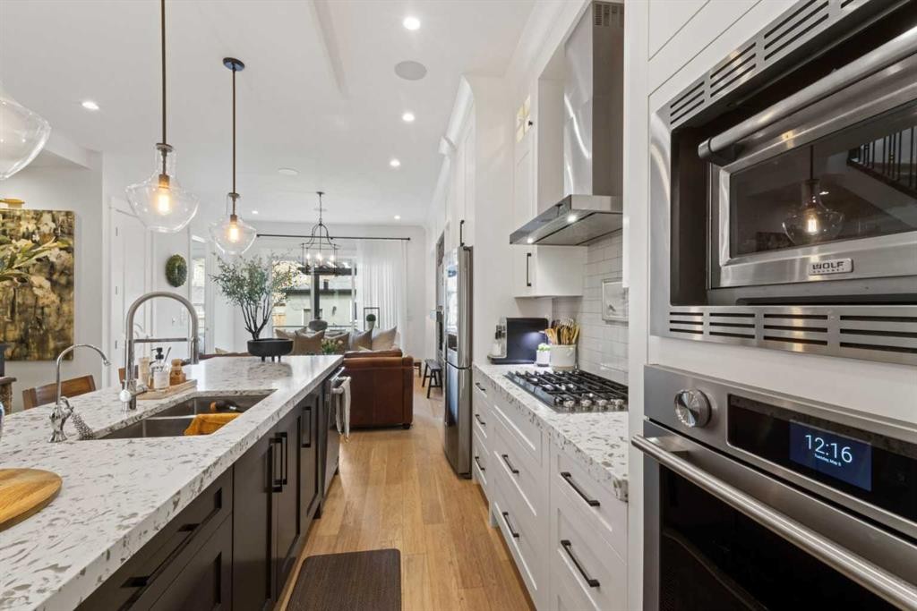2012 49 Avenue Sw, Calgary, AB - Indoor Photo Showing Kitchen With Double Sink With Upgraded Kitchen