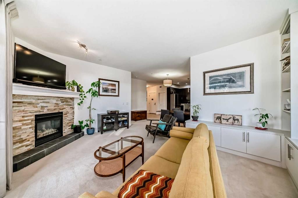 116-1005A Westmount Drive, Strathmore, AB - Indoor Photo Showing Living Room With Fireplace