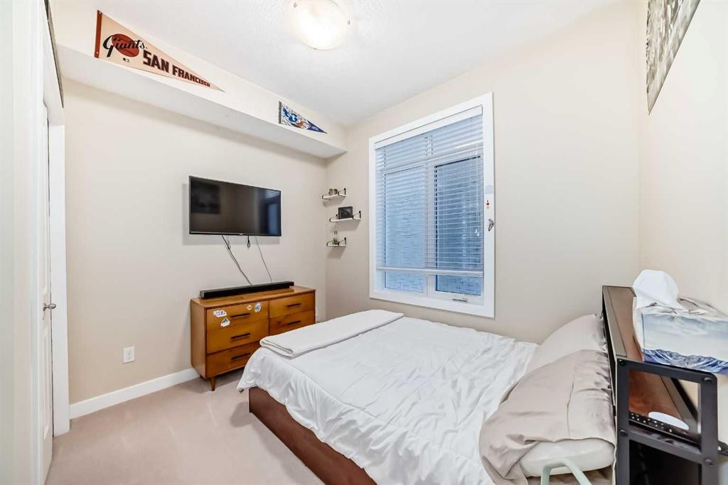 116-1005A Westmount Drive, Strathmore, AB - Indoor Photo Showing Bedroom