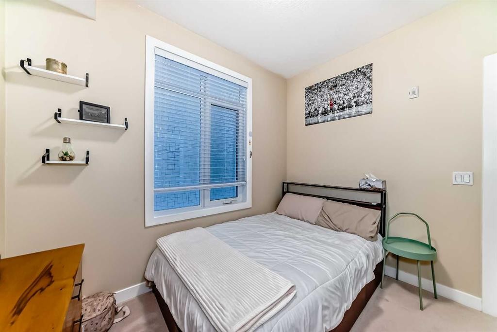 116-1005A Westmount Drive, Strathmore, AB - Indoor Photo Showing Bedroom