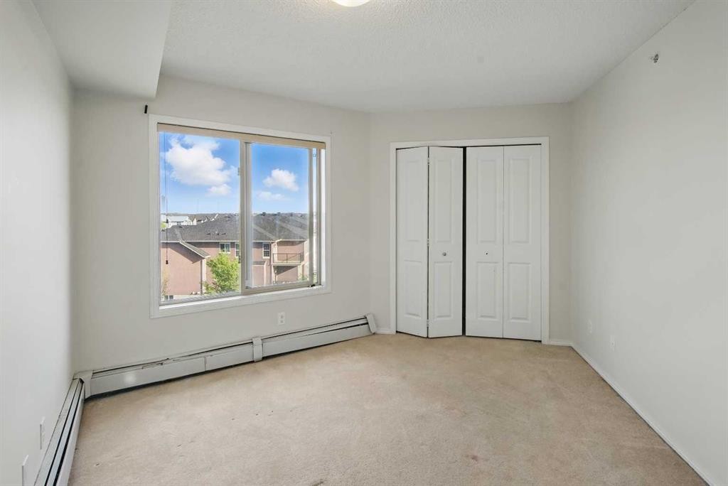 409-15 Saddlestone Way Ne, Calgary, AB - Indoor Photo Showing Other Room