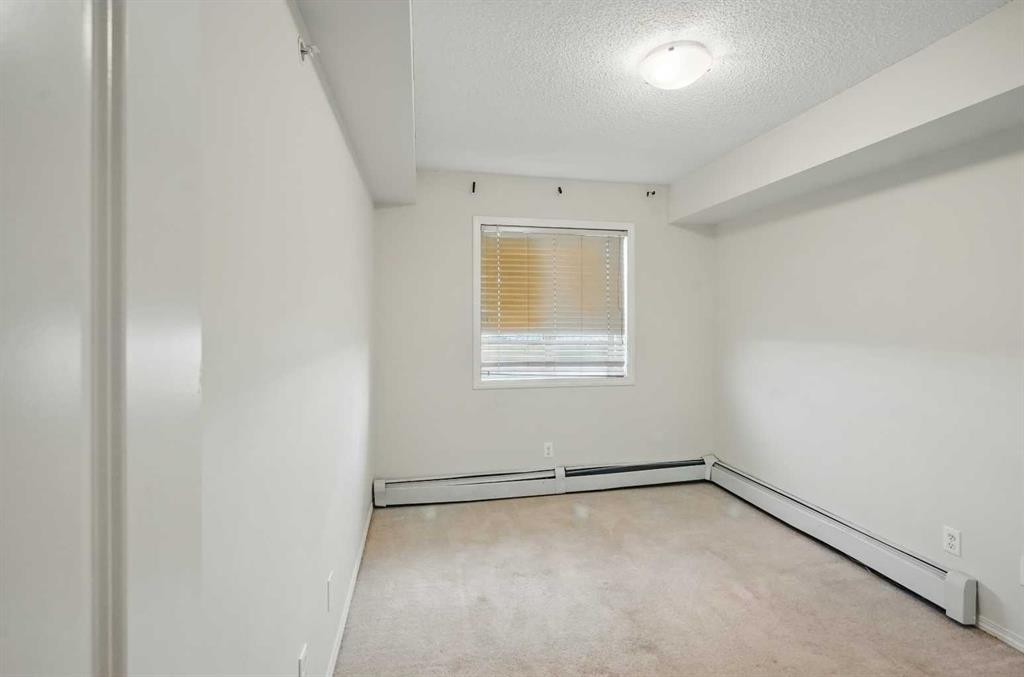 409-15 Saddlestone Way Ne, Calgary, AB - Indoor Photo Showing Other Room