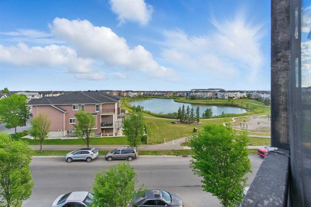 409-15 Saddlestone Way Ne, Calgary, AB - Outdoor With Body Of Water With View