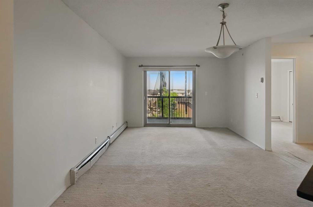 409-15 Saddlestone Way Ne, Calgary, AB - Indoor Photo Showing Other Room