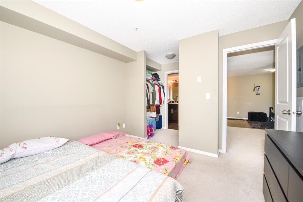 302-5 Saddlestone Way Ne, Calgary, AB - Indoor Photo Showing Bedroom