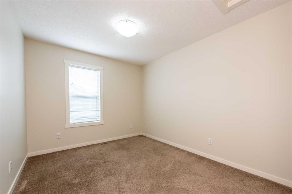 428 Cranbrook Square Se, Calgary, AB - Indoor Photo Showing Other Room