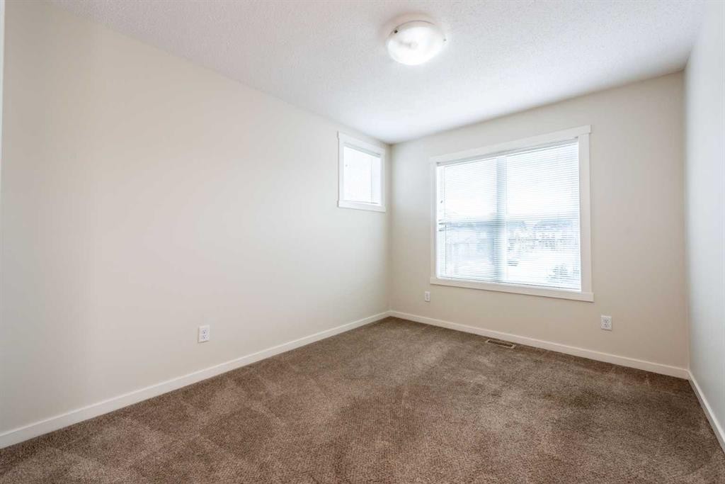 428 Cranbrook Square Se, Calgary, AB - Indoor Photo Showing Other Room