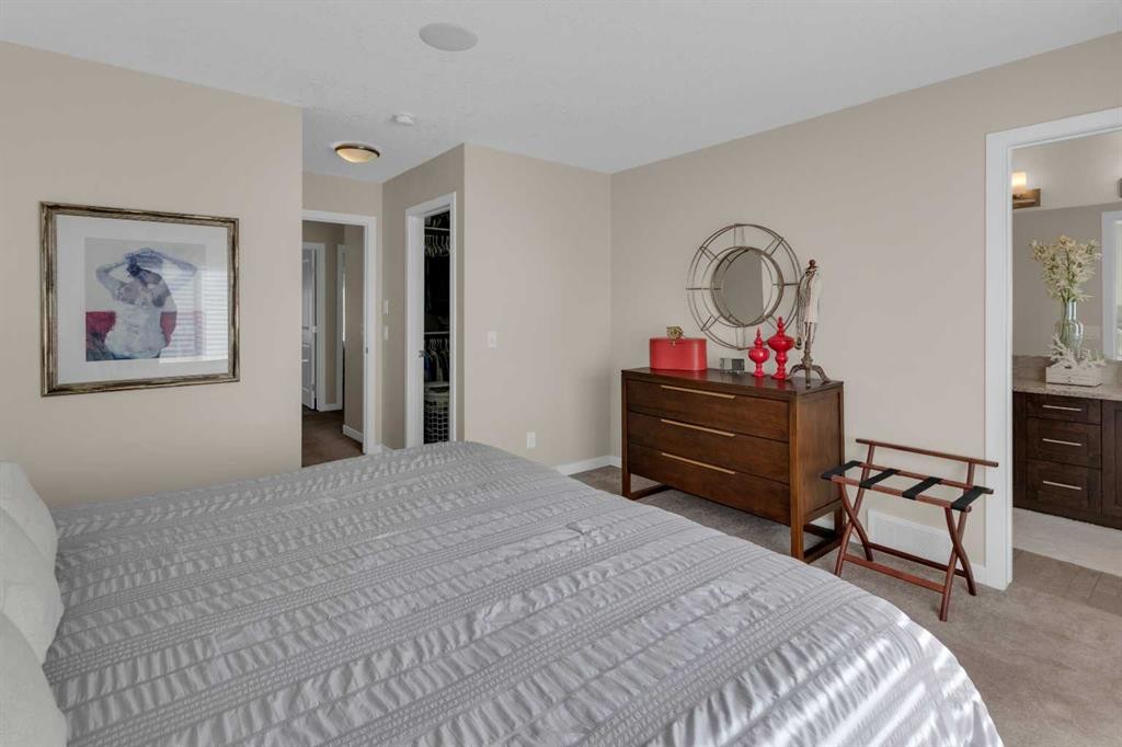216 Sundown Road, Cochrane, AB - Indoor Photo Showing Bedroom